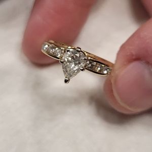 1 ct. Pear diamond solitaire and diamond wrap